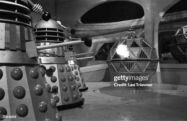 Three Daleks and a Mechonoid from the popular British television sci-fi series 'Doctor Who'.