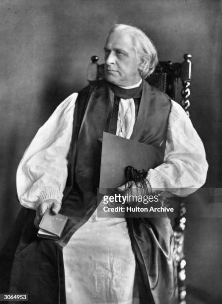 Holding a mortar-board and a prayer book, Archbishop of Canterbury Edward White Benson . Headmaster of Wellington College, in 1872 was appointed...