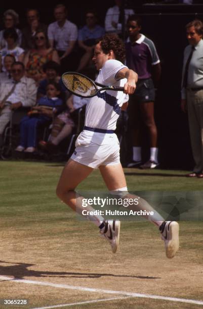 John McEnroe, American tennis star and bad boy of the tennis circuit, in action at the Wimbledon Tennis Championships.