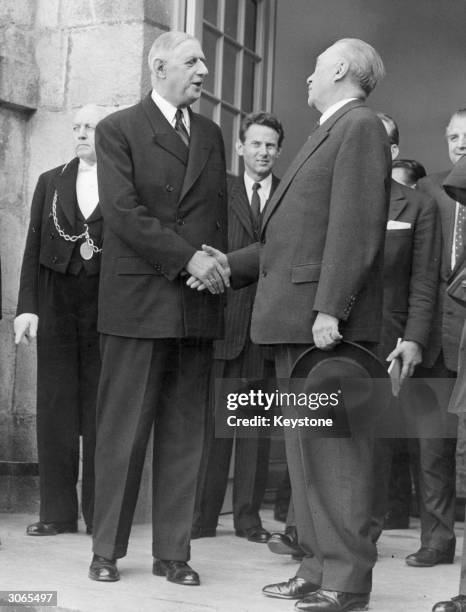 President Charles De Gaulle with German chancellor, Konrad Adenauer at a meeting at the Elysee Palace in Paris.