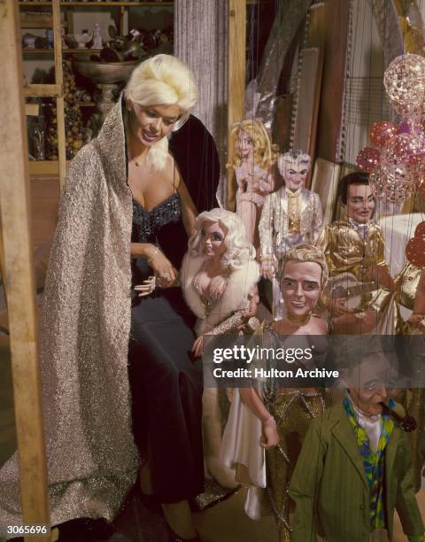 Hollywood film star Jayne Mansfield , formerly Vera Jane Palmer. She had a short career as a kind of living parody of Marilyn Monroe in films such as...