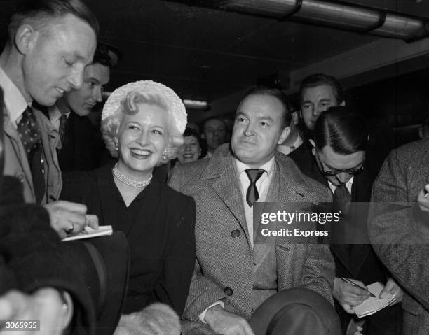 Comedian Bob Hope with actress Marilyn Maxwell at a press conference.