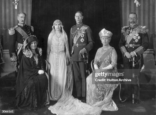 King George V of Great Britain and Queen Mary on the wedding day of their son George, later King George VI, to Elizabeth Bowes-Lyon . With them are...