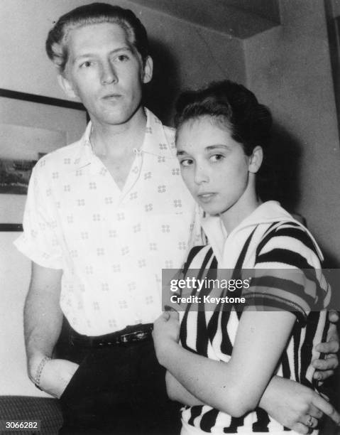 American rock 'n' roll singer Jerry Lee Lewis at the Westbury Hotel, London, with his fifteen year old wife Myra. The relationship caused even more...