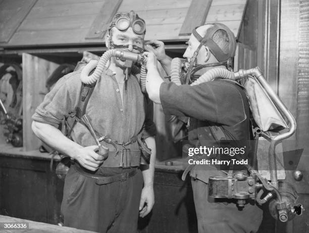 Men from Haig Pit in Whitehaven wearing breathing apparatus during a practice at Brigham rescue station.
