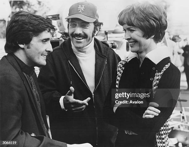 American author and film producer William Peter Blatty on the set of the 'Exorcist' with actors Jason Miller and Ellen Burstyn.