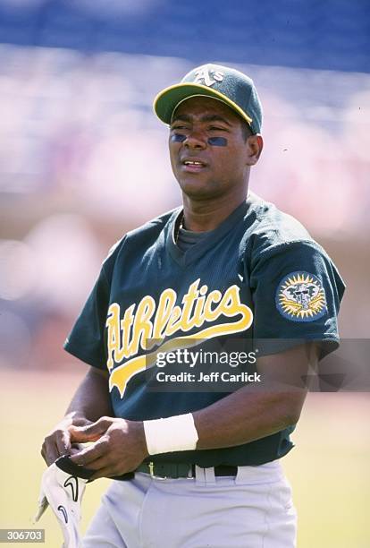 Miguel Tejada of the Oakland Athletics looks on during a spring training game against the Milwaukee Brewers at the Maryvale Baseball Park in Phoenix,...