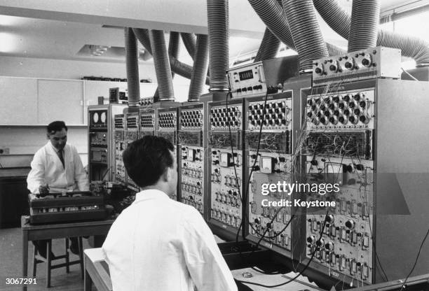 Newman and E K Sinton use an analogue computer to predict the possible results of scientific experiments.