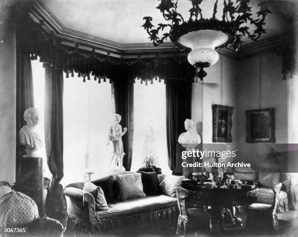 Victorian living room in Norris Green, with a bust of the late Prince Albert.