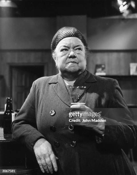 English actress Violet Carson playing the part of Ena Sharples in Coronation Street.