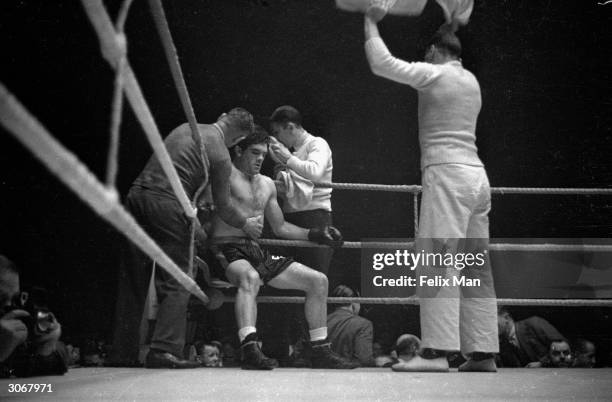 British boxer Freddie Mills during the British Heavyweight title fight against Jack London at Bellevue, Manchester. He became light heavyweight...