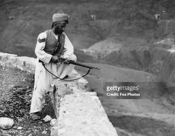 An Afridi tribesman guarding the Khyber Pass on the north-west frontier of Pakistan with Afghanistan.