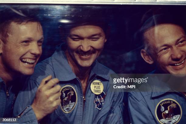 From left to right, Neil Armstrong, Michael Collins and Edwin 'Buzz' Aldrin Jnr, the crew of the historic Apollo 11 moon landing mission are...
