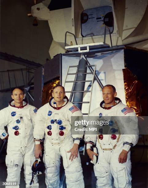 From left to right, astronauts Michael Collins, Neil Armstrong and Edwin 'Buzz' Aldrin Jnr, the crew of the lunar module Apollo 11 stand in front of...