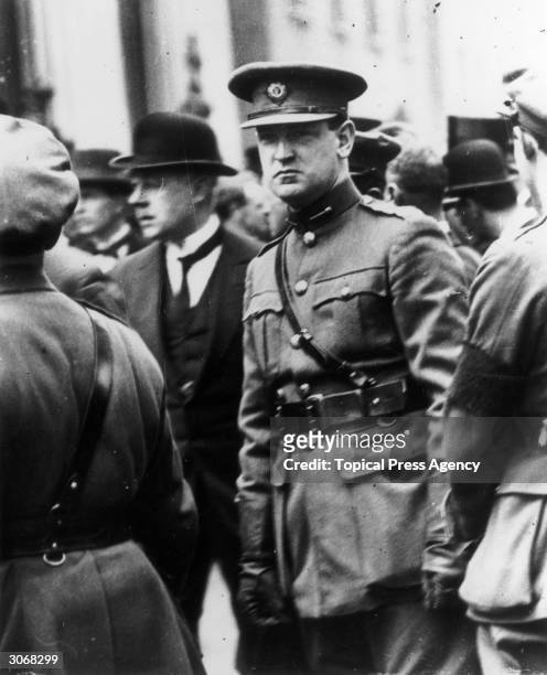 Irish politician and Sinn Fein leader Michael Collins attends the funeral of the Irish Free Stater and founder of Sinn Fein, Arthur Griffith. One...
