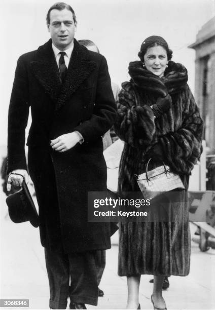 George, Duke of Kent and Marina, Duchess of Kent arrive at Croydon Airport, London en route to Germany to join the Duke of Windsor.