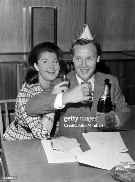 British light entertainer Nicholas Parsons celebrating his 39th birthday with his wife, Denise Bryer.