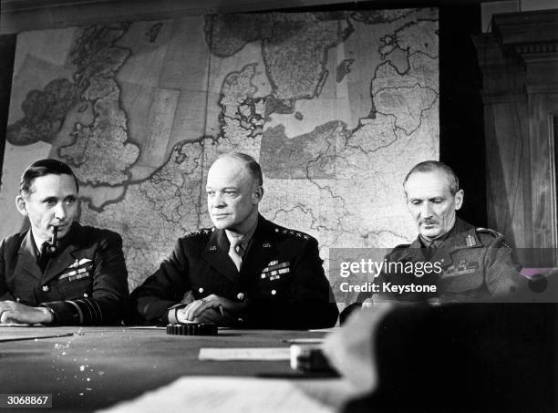 From left to right, Air Chief Marshall Tedder , General Eisenhower and Field Marshal Montgomery , the Supreme Command of the Allied Expedition Force...
