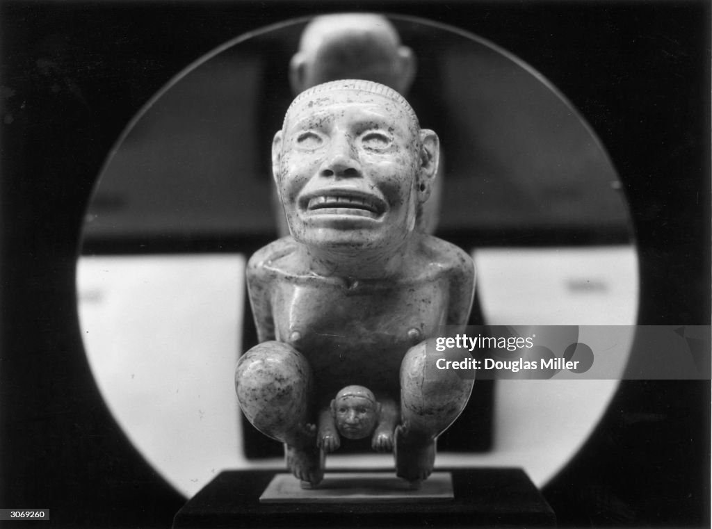 A Statue Of Tlazolteotl Ixuina Aztec Goddess Of Childbirth At An a-statue-of-tlazolteotl-ixuina-aztec-goddess-of-childbirth-at-an