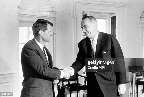 American Democratic politician Robert Kennedy meeting with President Lyndon Johnson to discuss his resignation as Attorney-General.