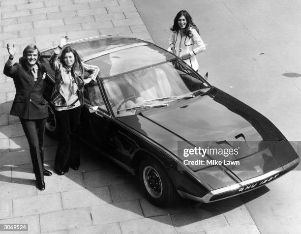 The Sotheby Special car which will be used to advertise W D & H O Wills cigarettes with its driver Graham Wrangles and the Sotheby's Special Reserve...