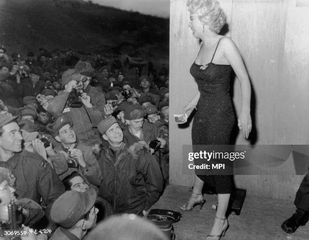 American actress Marilyn Monroe entertaining troops in Korea.