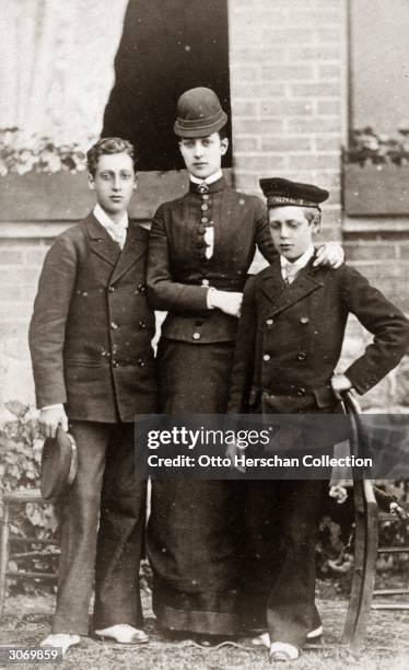 Alexandra , Princess of Wales with her sons Prince Albert Victor , Duke of Clarence and Prince George , later King George V. Original Artwork: Photo...