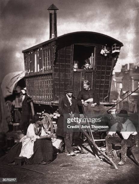 Gypsy caravan at an encampment near Latimer Road, Notting Hill, London. Original Publication: From 'Street Life in London' by John Thomson and...