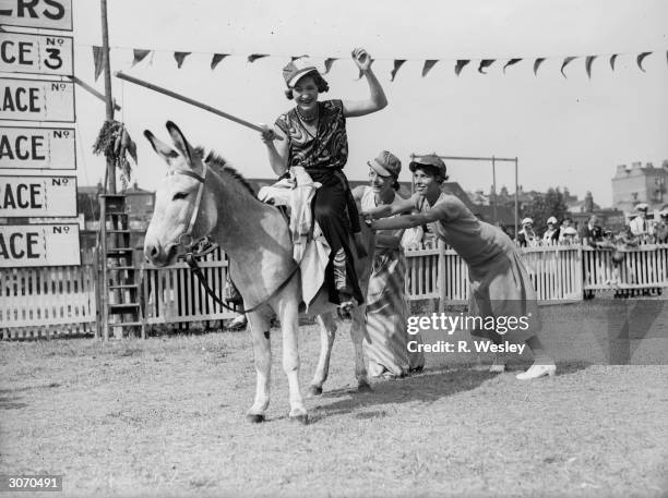 Contestant in a donkey derby at Margate.