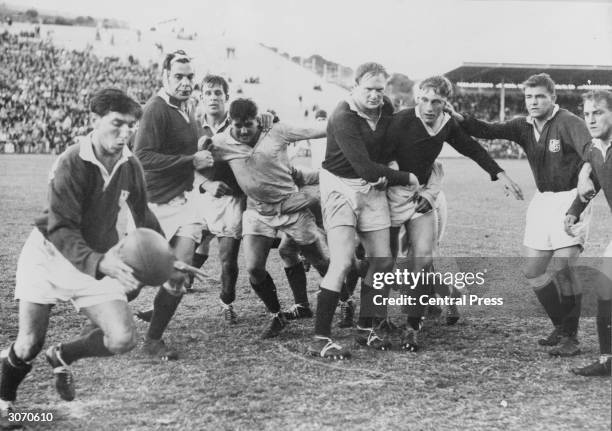 British Lions player A O'Connor gets the ball away during the match against Central Universities at Port Elizabeth which the Lions won by 14 points...