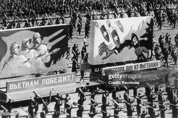 Pro-Vietnam/anti US posters on display during a May Day parade in Moscow.