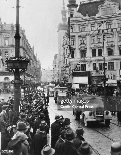 WW2 photo of crowd watching German troops WW2 photo of crowd watching German troops