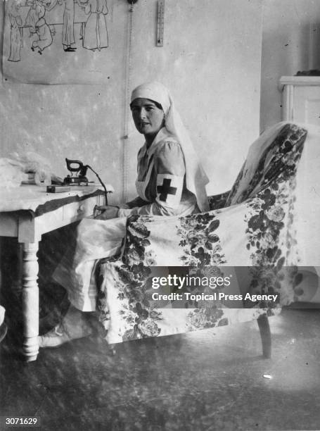 Nurse ironing bandages at the British hospital in Petrograd during World War I.