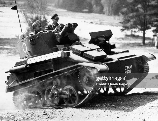 His Highness Saiyid Said bin Taimur, Sultan of Muscat and Oman, watches a tank demonstration at Aldershot.