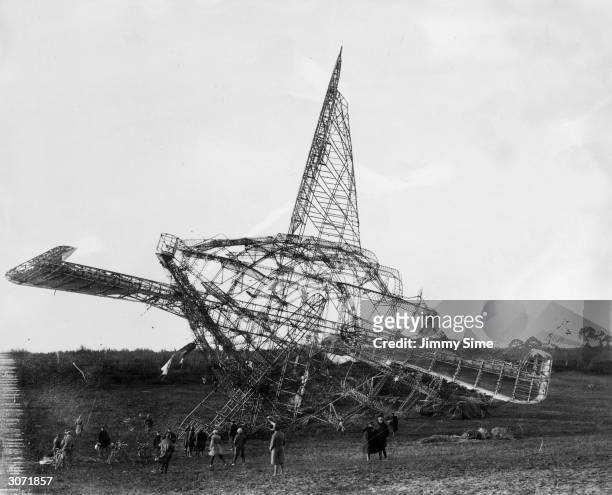 The tail of the wrecked R101 airship at Beauvais, France. The airship struck a ridge, exploded, and killed 48 passengers.