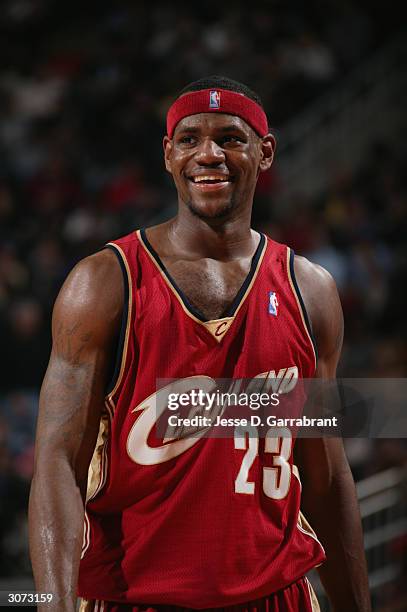 LeBron James of the Cleveland Cavaliers smiles during the game against the Houston Rockets at Toyota Center on February 25, 2004 in Houston, Texas....