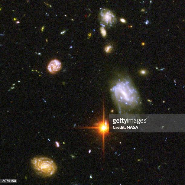 In this NASA handout, a view of deepest view of the visible universe ever achieved are seen in a Hubble Telescope composite photograph released March...