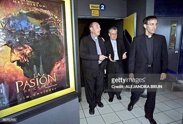 Peruvian clergymen walk out of the cinema after watching Mel Gibson's controversial biblical blockbuster "The Passion of the Christ", 11 March 2004...