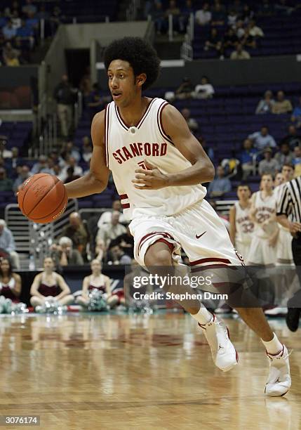 Josh Childress of the Stanford Cardinal moves the ball during the quarterfinals of the 2004 Pacific Life Pac-10 Tournament against the Washington...