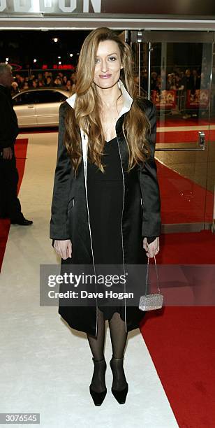 Actress Natascha Mcelhone arrives at the UK Premiere of the movie remake of U.S TV series, "Starsky And Hutch" at the Odeon, Leicester Square on...
