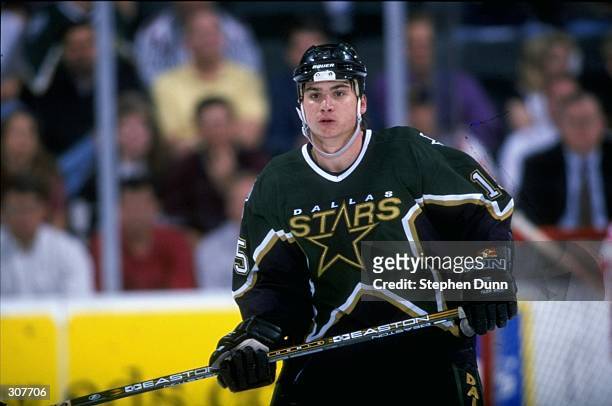 Left wing Jamie Langenbrunner of the Dallas Stars in action during a game against the Detroit Red Wings at the Reunion Arena in Dallas, Texas. The...