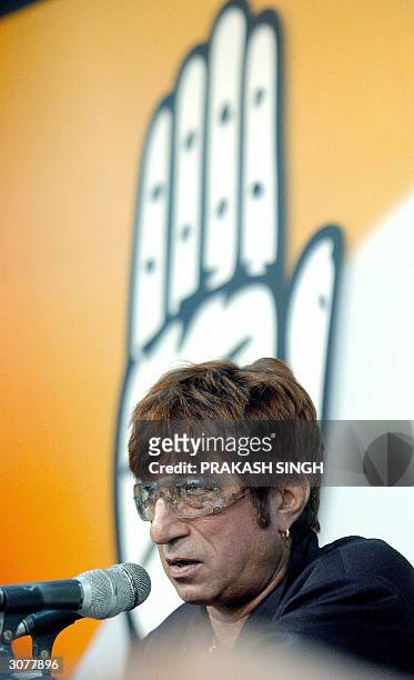 In this file photo taken, 02 March 2004, Indian actor Shakti Kapoor addresses a press conference at the headquarters of Opposition Congress Party in...