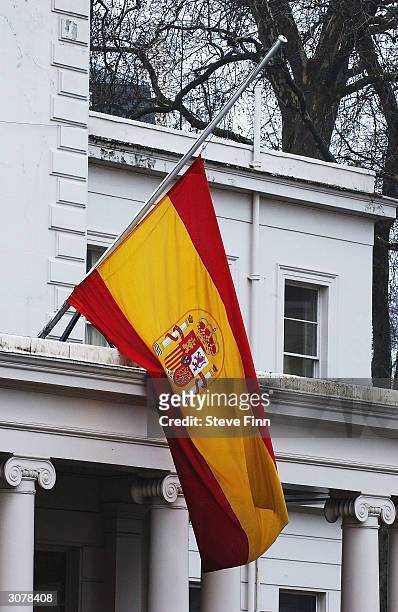 The Spanish Flag flies at half-mast outside the Spanish Embassy during a minute's silence held to honour the victims of the Madrid train bombings on...