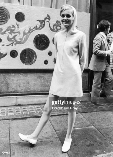 Year-old British fashion model Twiggy wearing a hooded mini-dress, London, 23rd May 1967.