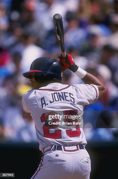 Outfielder Andruw Jones of the Atlanta Braves in action during a game against the Colorado Rockies at Coors Field in Denver, Colorado. The Braves...