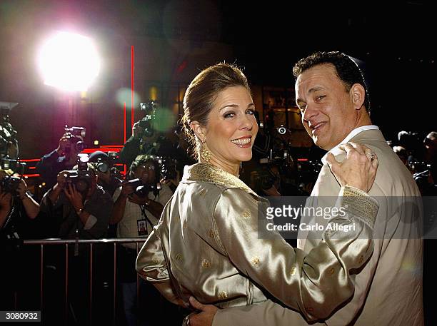 Actor Tom Hanks with wife Rita Wilson arrives the world premiere of his movie 'Ladykillers' at the El Capitan Theatre March 12, 2004 in Hollywood,...