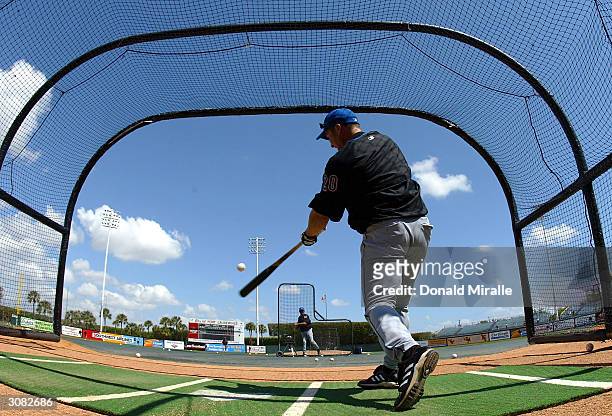 Karim Garcia of the New York Mets swings from the batting cage before his team's game against the Baltimore Orioles during Spring Training on March...
