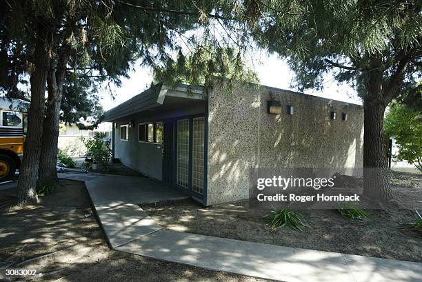 The house where nine bodies were found is seen March 13, 2004 in Fresno, California. According to reports, the bodies were found entwined in piles of...