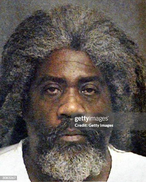 Police booking photo of 57-year-old Marcus Wesson is seen March 13, 2004 in Fresno, California. According to reports, nine bodies were found entwined...