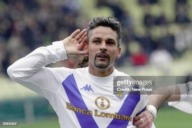 Brescia's Roberto Baggio celebrates scoring his 200th Serie A career goal during the Serie A match between Parma and Brescia on March 14, 2004 in...